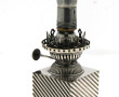 Petite lampe à pétrole en métal argenté,
