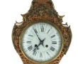 Pendule cartel dans le style Louis XV à 