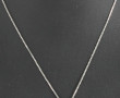 Pendentif noir facetté et strass blanc, 
