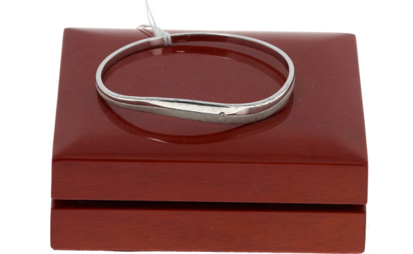 Bracelet jonc en argent serti d'un petit