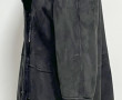 Manteau noir en mouton retourné, taille 