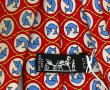 HERMES Paris - Cravate en soie à fond ro