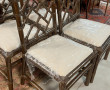Paire de fauteuils en rotin et 4 chaises