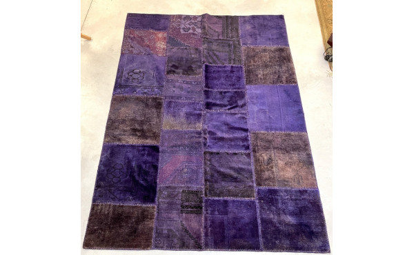 Original tapis en laine dans les tons de