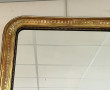 Miroir XIXème en bois et stuc doré, H 90