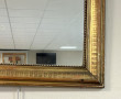 Miroir XIXème en bois et stuc doré, H 90