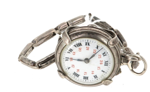 Montre en argent non fonctionnelle