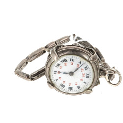Montre en argent non fonctionnelle