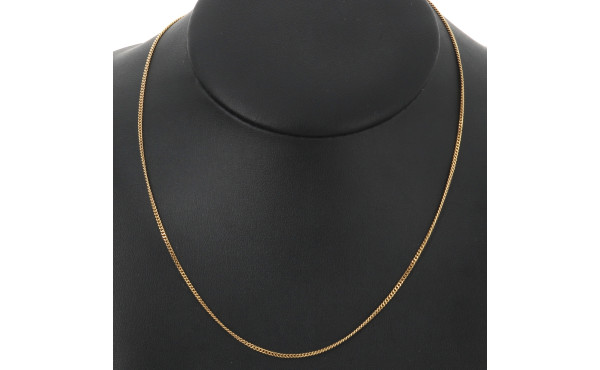 Chaîne en or jaune 18 carats, poinçon tê