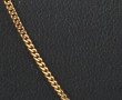 Chaîne en or jaune 18 carats, poinçon tê