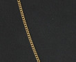 Chaîne en or jaune 18 carats, poinçon tê