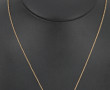Collier en or jaune 18 carats, poinçon t