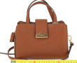 POURCHET - Sac en cuir camel, à deux ans