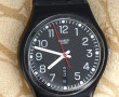 SWATCH - Montre noire bracelet cuir, en 