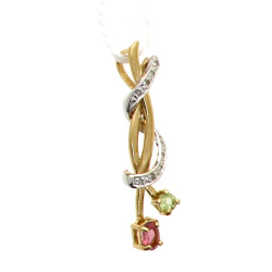 Pendentif en or jaune et gris 750ème sertie