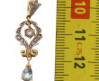 Pendentif en or jaune, topaze bleu ciel 