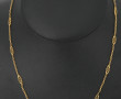 Collier en or jaune 18 cts, poinçon tête