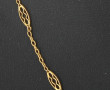 Collier en or jaune 18 cts, poinçon tête