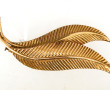 Broche 2 plumes en plaqué or, L 5,8 cm