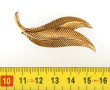 Broche 2 plumes en plaqué or, L 5,8 cm