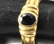 Bague jonc en or jaune, sertie d'une spi