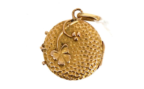 Petit pendentif circulaire ouvrant en or