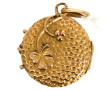 Petit pendentif circulaire ouvrant en or