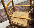 Deux fauteuils en bois fruitier décor co