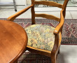 Deux fauteuils en bois fruitier décor co