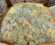 Deux fauteuils en bois fruitier décor co
