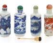 CHINE - 4 tabatières en porcelaine décor