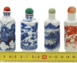 CHINE - 4 tabatières en porcelaine décor