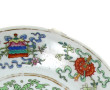 CHINE - Deux assiettes creuses en porcel