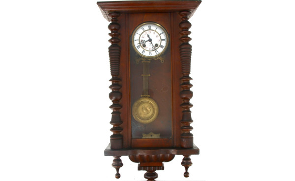 Pendule murale en bois foncé, cadran éma