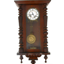 Pendule murale en bois foncé, cadran éma