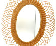 Miroir de forme ovale, entourage en roti
