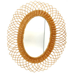 Miroir de forme ovale, entourage en roti
