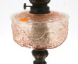 Lampe à pétrole en métal à décor rocaill