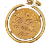 Médaille à décor d'un angelot en or jaun
