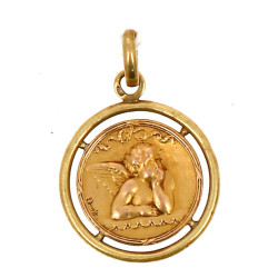 Médaille à décor d'un angelot en or jaun