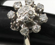Bague en or gris 18 carats, poinçon tête