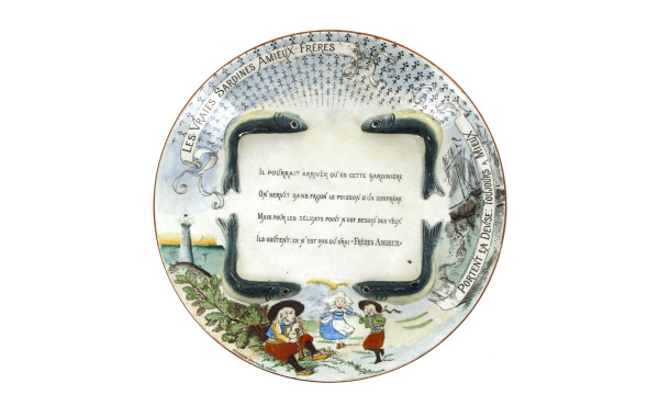 Assiette publicitaire en faïence fine "L