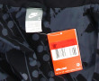 NIKE - Blouson femme noir à pressions et