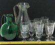 Deux pichets anciens, l'un en verre tran