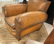 Fauteuil club ancien en cuir (usures et 