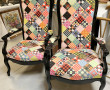 2 fauteuils voltaire laqués noir et tiss