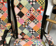 2 fauteuils voltaire laqués noir et tiss