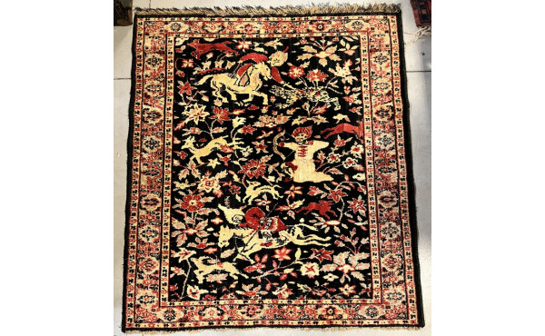 Tapis iranien en soie à décor d'une scèn