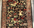 Tapis iranien en soie à décor d'une scèn