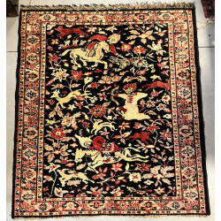 Tapis iranien en soie à décor d'une scèn